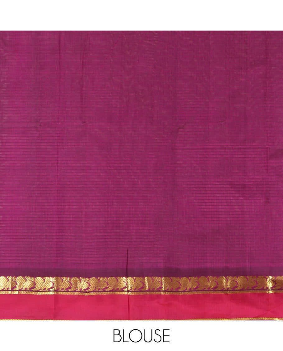 Green Kanchipuram Silk Saree, Sparsely Sparkled with Vazhaipoo Stripes and Zari Buttas on Its Body, Complemented by Contrast Rettai Pettu Border of Mayil, and Kathir Designs, Zari-Striped Pallu, and Paired with a Contrast Blouse
