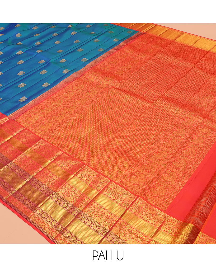 Blue Kanchipuram Silk Saree, Accentuated with Mayil Buttas, a Contrast Korvai Border of Thilakam Mokku, Yaali, Kamalam, Kuyil Kann, Mayil, and Dhavana Kodi, Jaal Pallu, and a Contrast Blouse