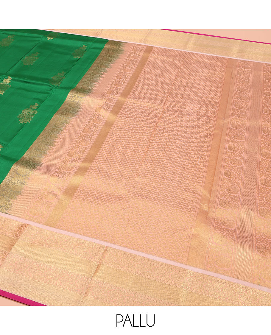 Green Vasundhara Lite Silk Mix Saree, Accentuated with Zari Buttas All Over Its Body, Complemented by a Contrast Border of Muthu, Kodi Visiry, and Mayil Kann Designs, Pallu Steeped with Stripes and Thilakam Designs, and Paired with a Contrast Blouse