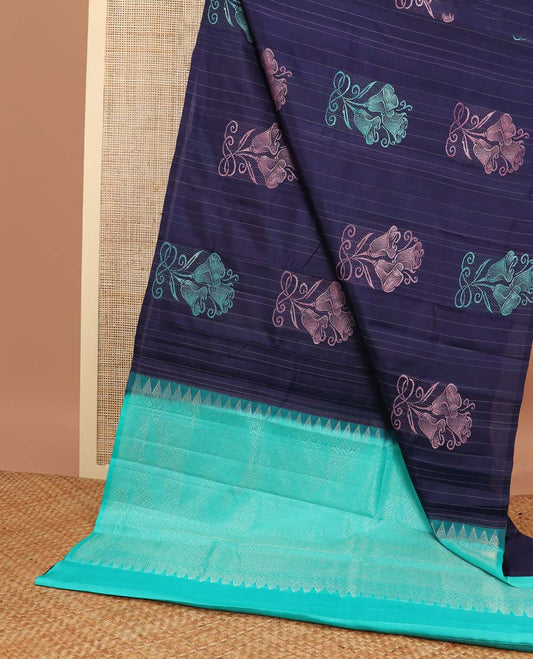 Blue striped, floral design kancheepuram silk sareee with geometric design pallu