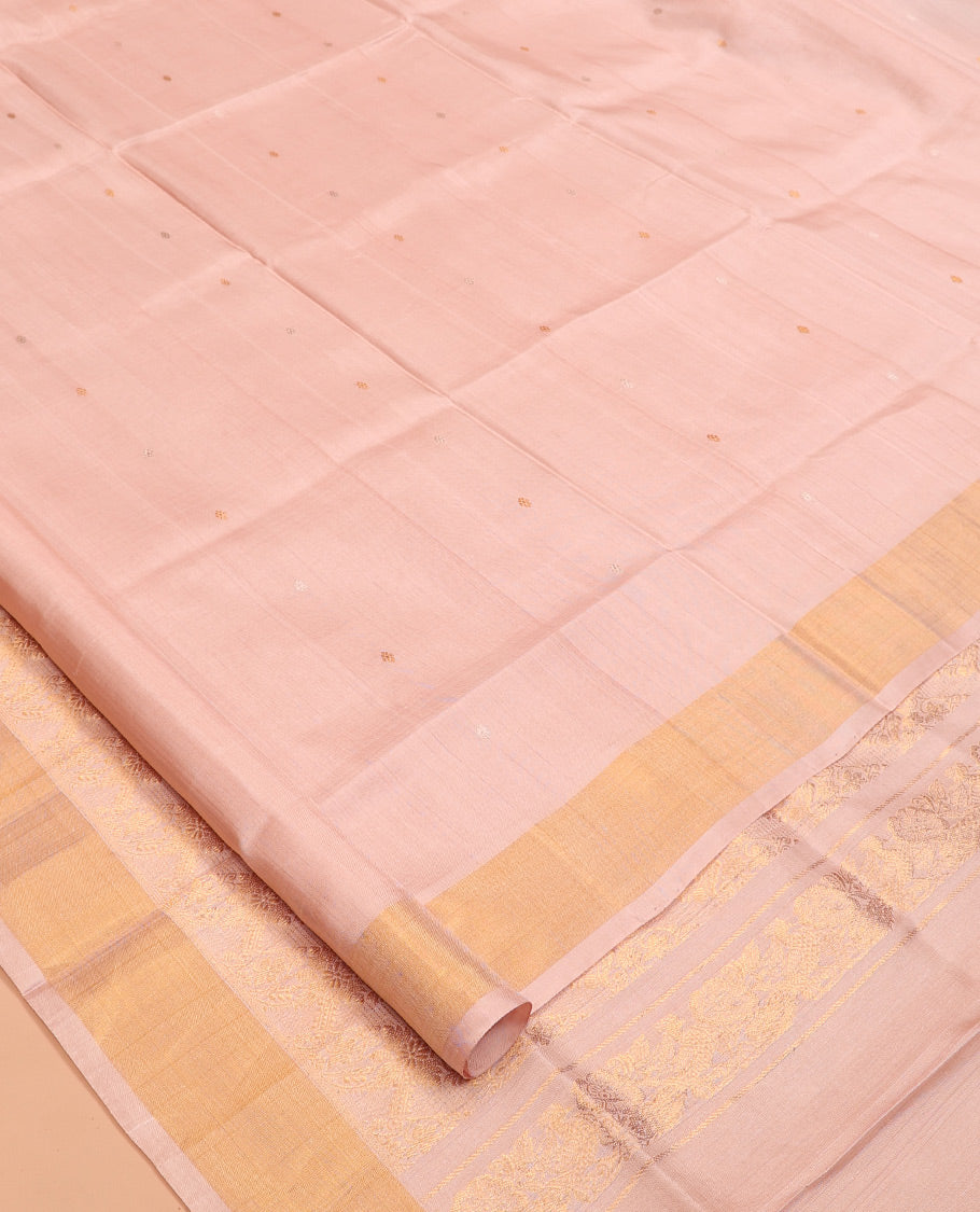 Peach Uppada Silk Saree, Ornamented with Zari Buttas, a Bavanji Border, Floral Jaal Pallu, and a Matching Blouse
