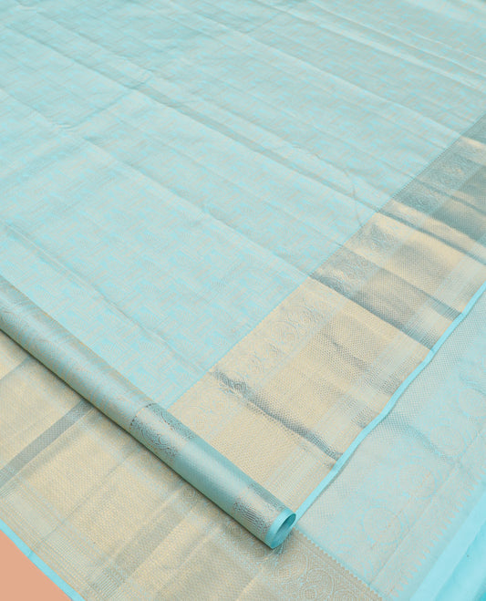 Pale Blue Jacquard Kanchipuram Wedding Silk Saree, Highlighted by a Zari Border of Thilakam Mokku, Arumbu Manga, and Mayil Kann Designs, Grand Jaal Pallu, and Matching Blouse