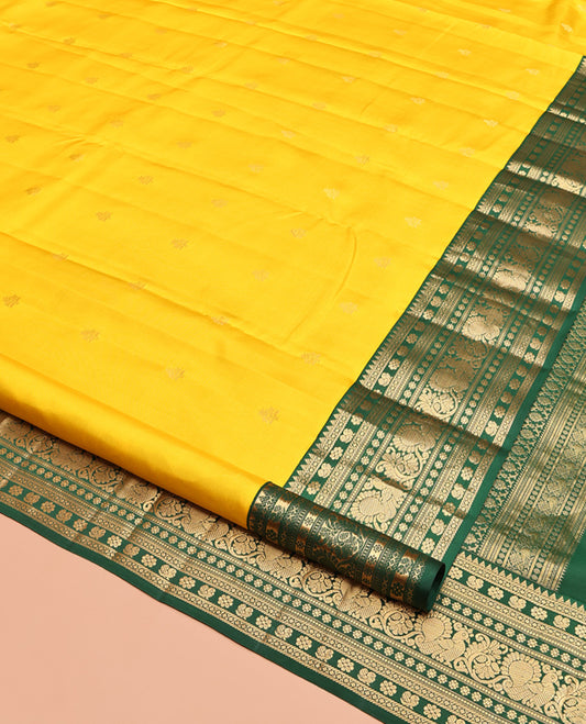 Yellow Vasundhara Silk Saree, Sparsely Woven with Zari Buttas, Contrast Border of Rekku, Kamalam, and Mayil Designs, Grand Pallu, and a Contrast Blouse