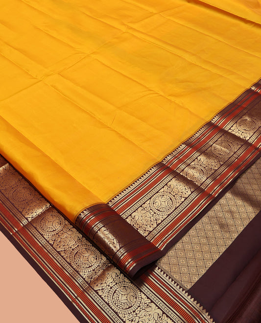Yellow Plain Vasundhara Lite-Silk Mix Saree, Complemented by a Contrast Border of Muthu, Kathir, and Chakram Designs, Jaal Pallu, and a Contrast Blouse