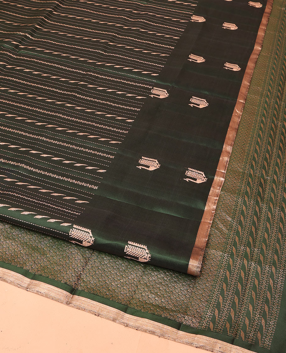 Green Mayuri Soft Silk Saree, Mesmerized with Neli, and Muthu Designs  All Over Its Body, Highlighted by Zari Border of Peacock Designs, Boldly Accentuated Jaal Pallu, and Paired with a Matching Blouse