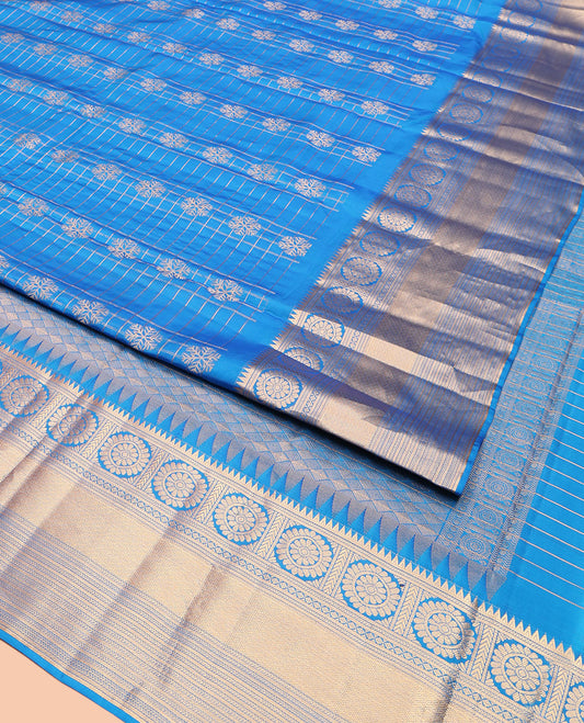 Blue Vasundhara Lite-Silk Mix Saree, Artfully Woven with Snowflake Buttas Enclosed Checks, Highlighted by Zari Border of Rekku, Chakram, Kathir, and Diamond Designs, Gleaming Jaal Pallu, and Paired with a Matching Blouse