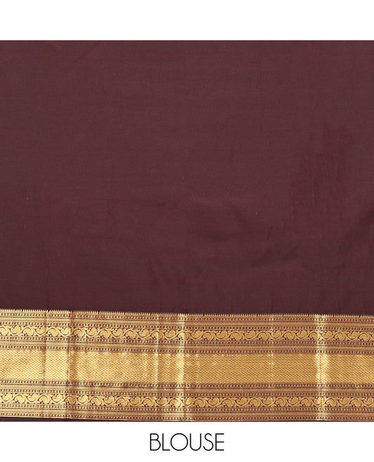 Brown Budget Silk Saree, Highlighted by Zari Buttas All Over Its Body, Spotlighted By Traditional Zari Designs Woven Border, Intricate Pallu, and Paired With a Matching Blouse