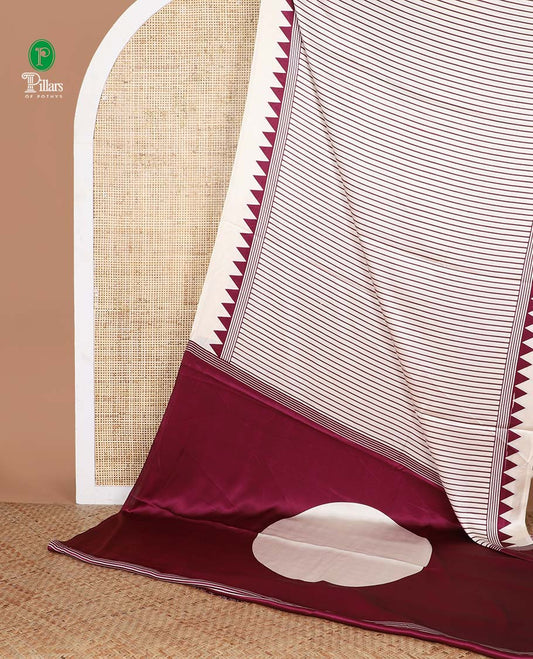 White with purple vertical lining printed design semi modal crepe saree with temple border & circle butta pallu along with printed blouse