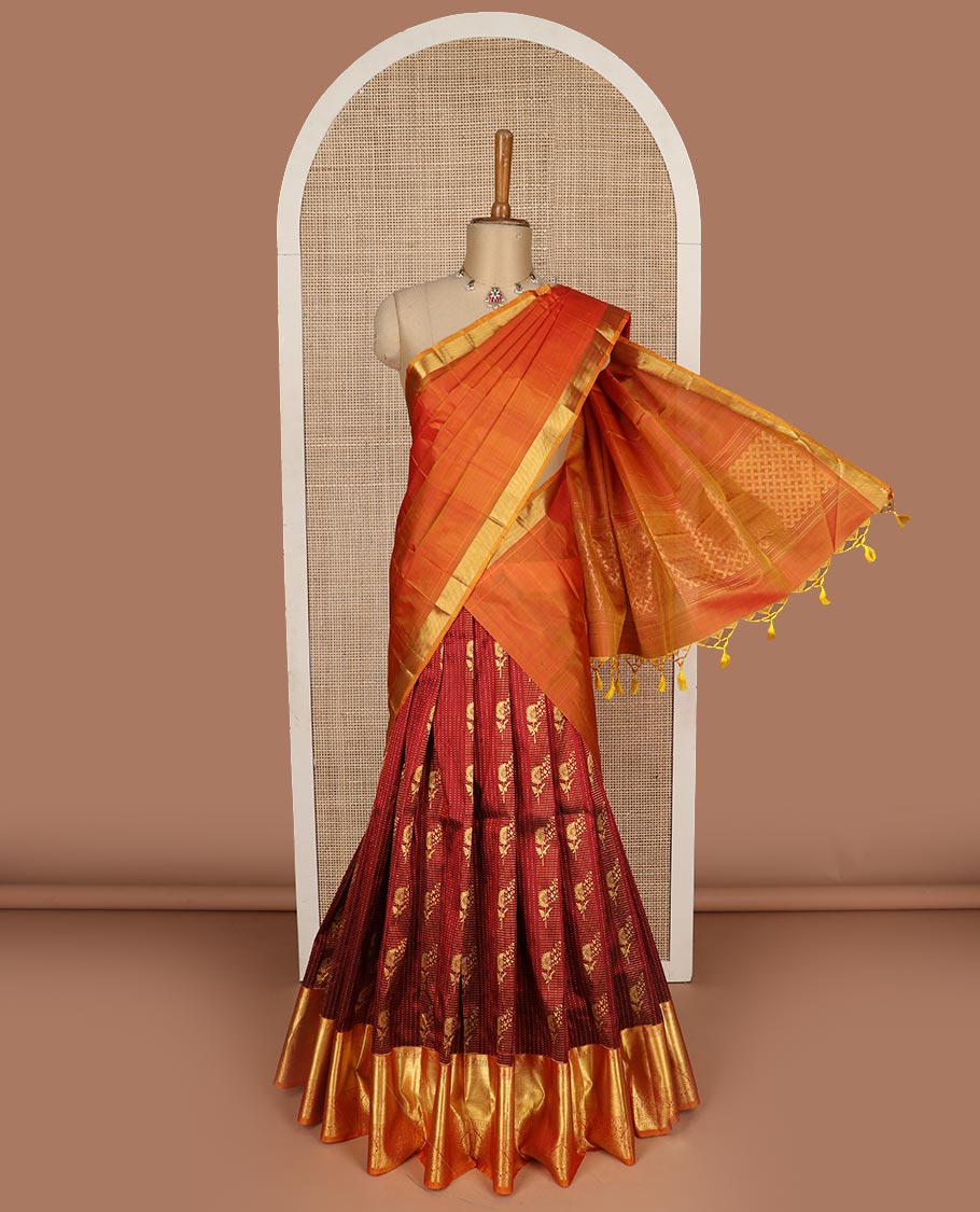 Maroon pure silk half saree, zari design skirt, contrast border and blouse of thilakam mokku, muthu, rudraksham, and manga design, and zari design dhavani