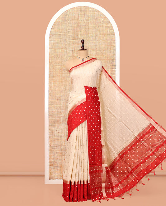 Sandal Assam Silk Saree, Steeped with Zari Buttas, Complemented by a Contrast Zari Buttas Woven Border, Zari Design Pallu, and a Contrast Blouse