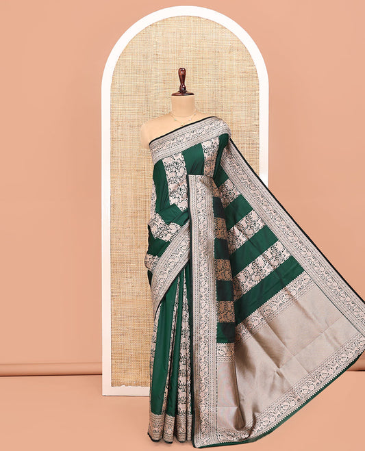 Green Banarasi Silk Saree, Opulently Embellished with Floral and Animal Motifs on Its Body, Highlighted by a Self-Border of Traditional Designs, Pallu of Stripes, and Paired with a Matching Blouse