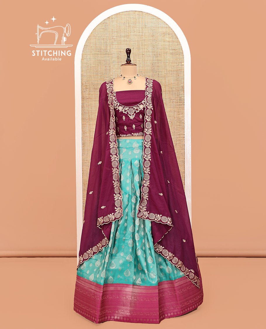 Green Art Silk Half Saree Features Buttas Steeped Skirt, Complemented by Contrast Traditional Border, Contrast Blouse, and a Embroidery Scallop Dhavani