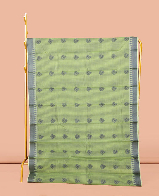 Green Semi-Silk Cotton Saree, Subtly Sparkled with Buttas and Micro-Checks All Over Its Body, Highlighted by a Temple Border, Intricate Pallu, and Paired with a Contrast Blouse
