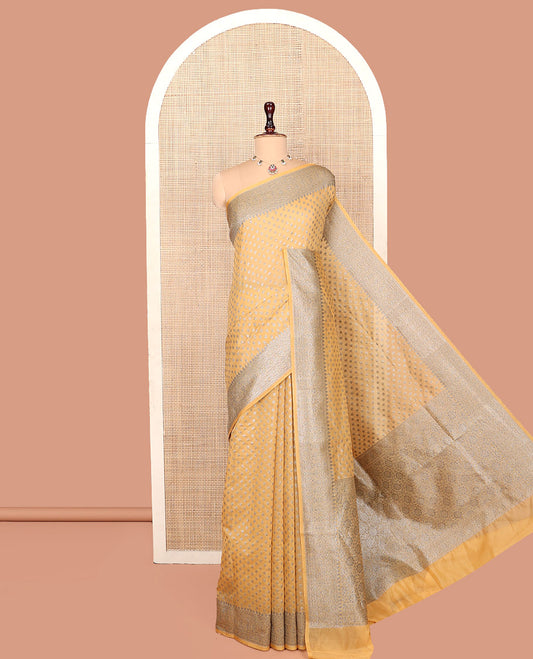 Yellow Georgette Saree, Steeped with Buttas, Highlighted by a Traditional Border, Intricately Designed Pallu, and a Matching Blouse