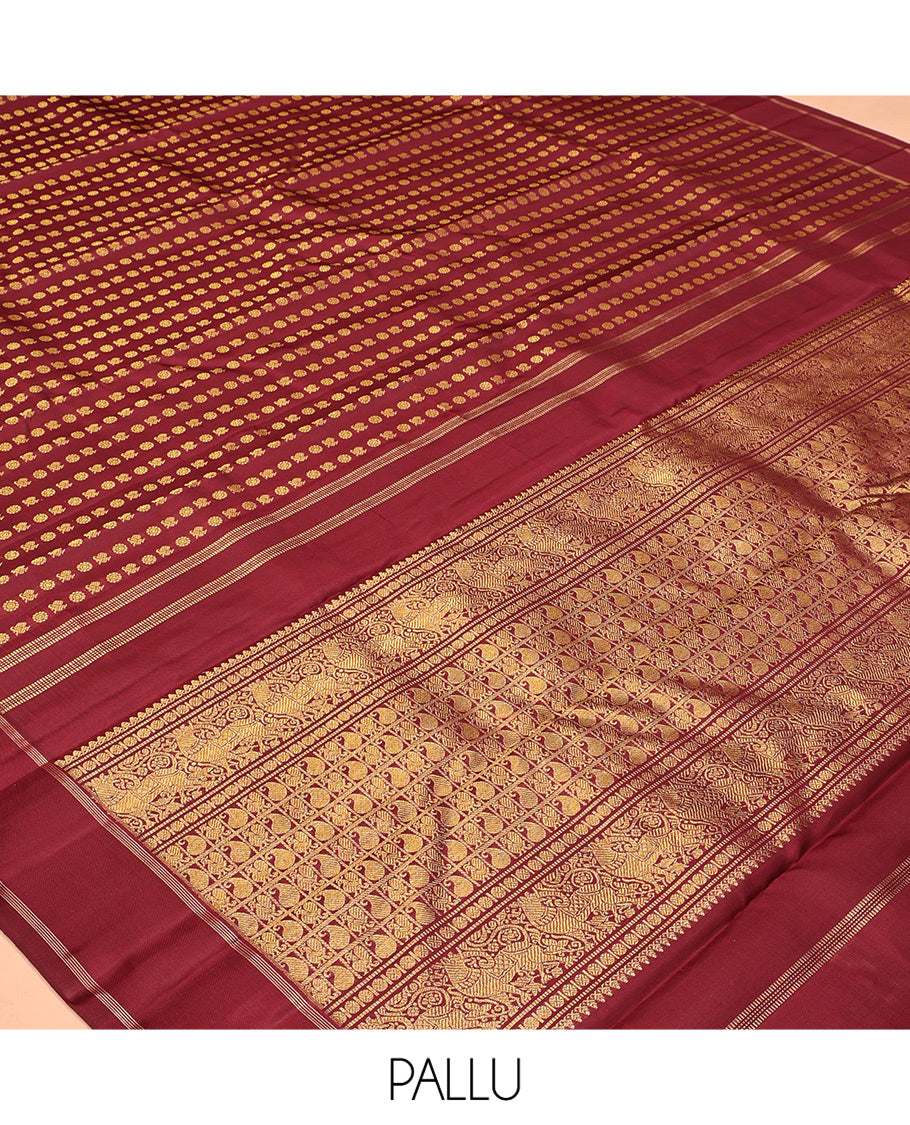 Light Maroon Kanchipuram Designer Silk Saree, Steeped in Richness of Mayil-Chakram Buttas, a Subtle Bodi Border, Butta-Enclosed Checked Pallu, and a Matching Blouse
