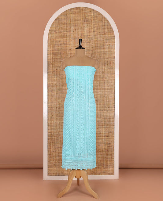 Persian green material chudidar set, paisleys and jaal schiffli sequins embroidered mul georgette top, a matching bottom, and a mirror work dupatta