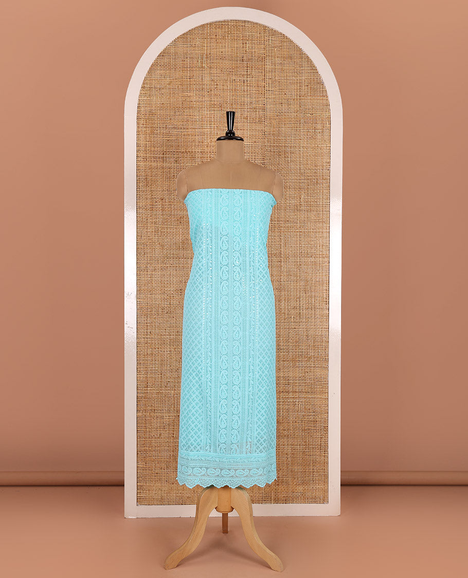 Persian green material chudidar set, paisleys and jaal schiffli sequins embroidered mul georgette top, a matching bottom, and a mirror work dupatta