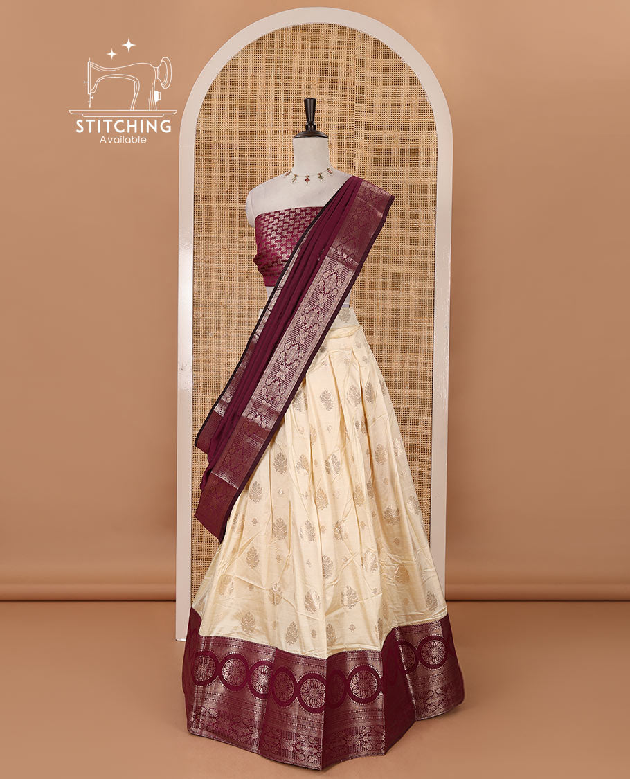 Cream-magenta semi-banaras half-saree, zari buttas & contrast traditional zari border skirt, jacquard blouse & intricately zari woven dhavani
