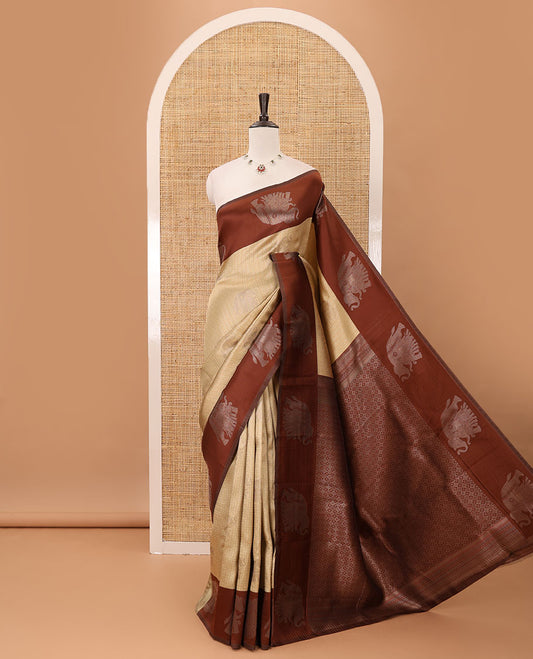 Sandal zari checked & elephant motifs woven kanchi silk saree, contrast korvai-style border of elephant motifs, intricate pallu & plain blouse
