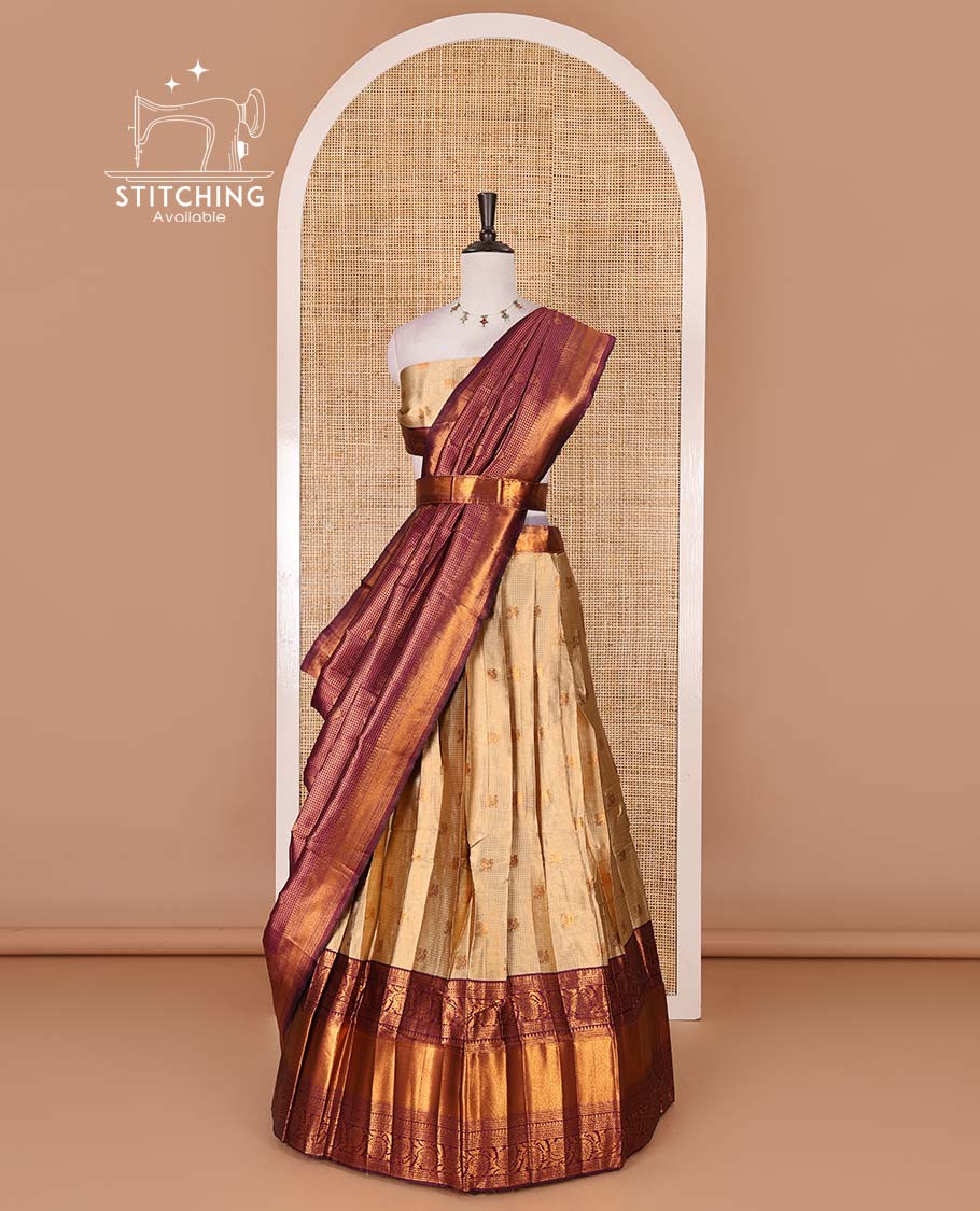 Gold banaras half saree, zari buttas with contrast wine traditional zari border skirt, matching blouse, dhavani of zari checks, and buttas