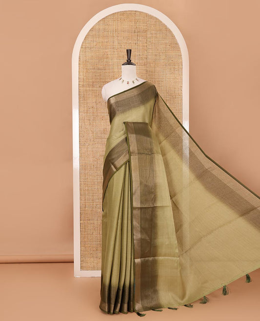 Olive green plain tissue saree, contrast gold zari piping border & self pallu with tussels
