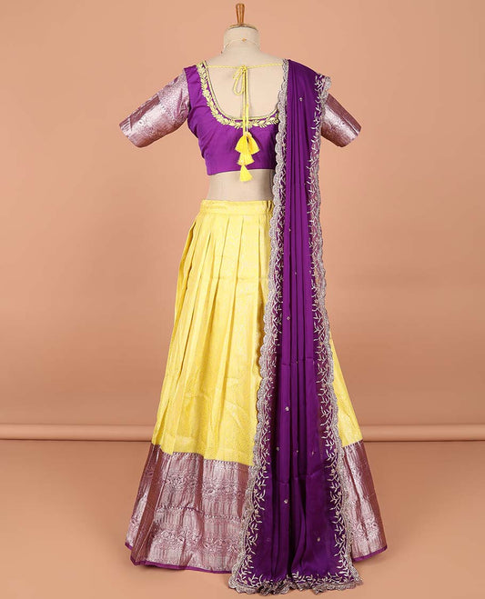 Yellow  floral jacquard semi-stitched half saree with contrast zari border,  embroidered blouse & scallop border dhavani