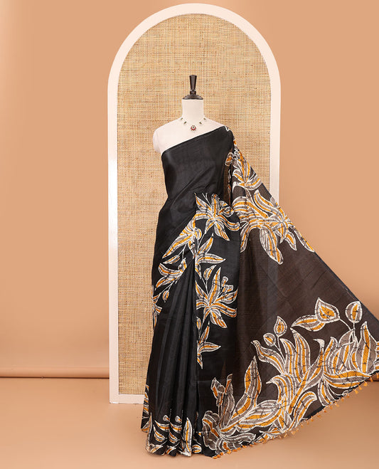 Black-base plain body khadi cotton saree with batik-style orange-color floral printed border & pallu, line-type blouse