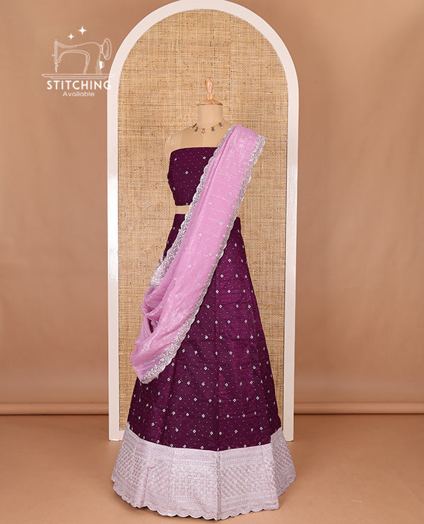 Purple half-saree, floral motifs embroidered semi raw silk top, matching embroidered blouse, and contrast scallop embroidered georgette dhavani
