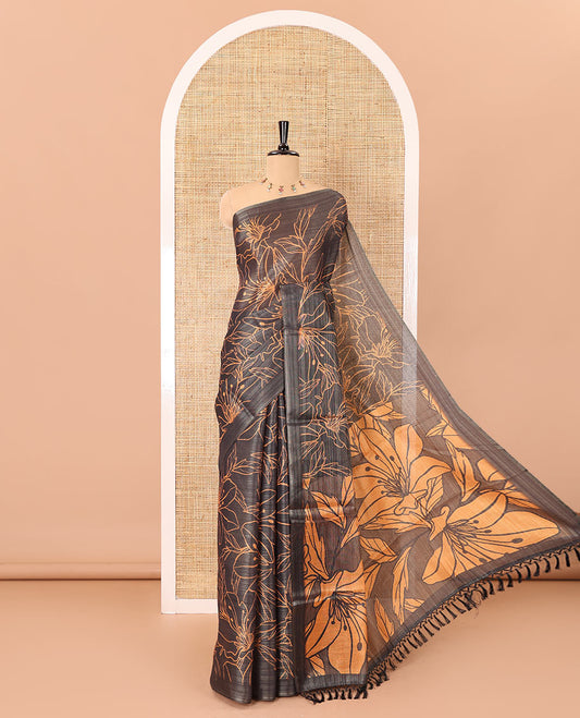 Borderless black big floral motifs printed tissue silk saree with floral printed pallu, and a contrast plain blouse