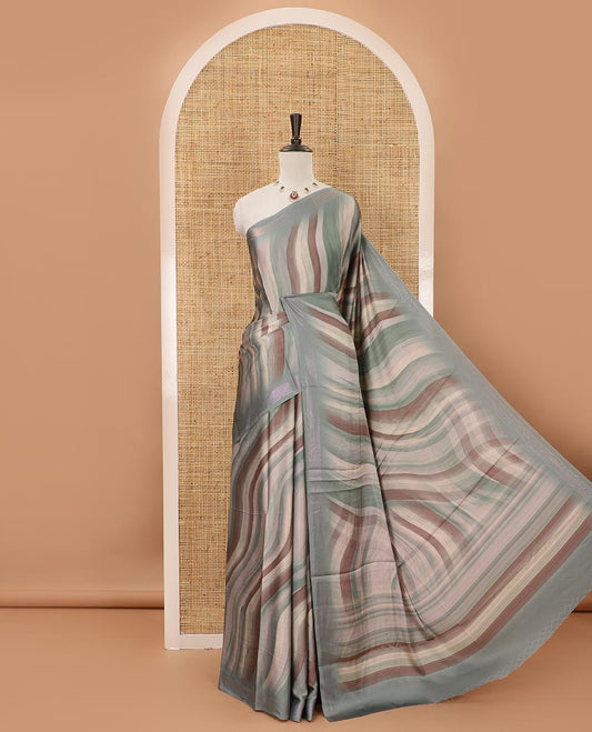 Blue ombre-color abstract-printed satin crepe saree, copper zari line weave border & matching jaal printed blouse