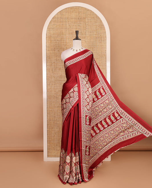 Maroon plain gajji silk saree with ajrak printed border, ajrak printed geometric pallu, and printed blouse