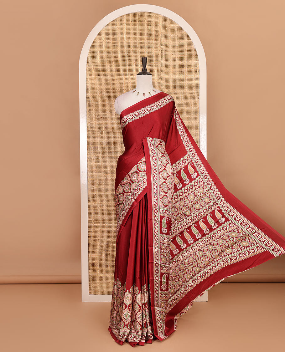 Maroon plain gajji silk saree with ajrak printed border, ajrak printed geometric pallu, and printed blouse