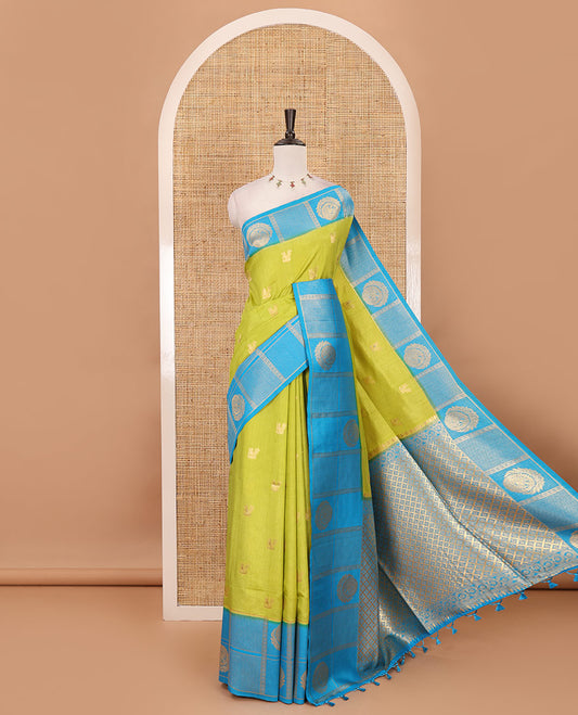 Parrot green peacock buttas dola silk saree, contrast kanchipuram-style traditional zari border, zari pallu & contrast zari border blouse