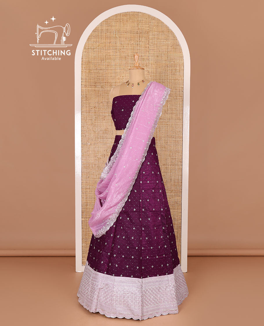 Purple half-saree, floral motifs embroidered semi-raw silk top, matching embroidered blouse, and contrast scallop embroidered georgette dhavani