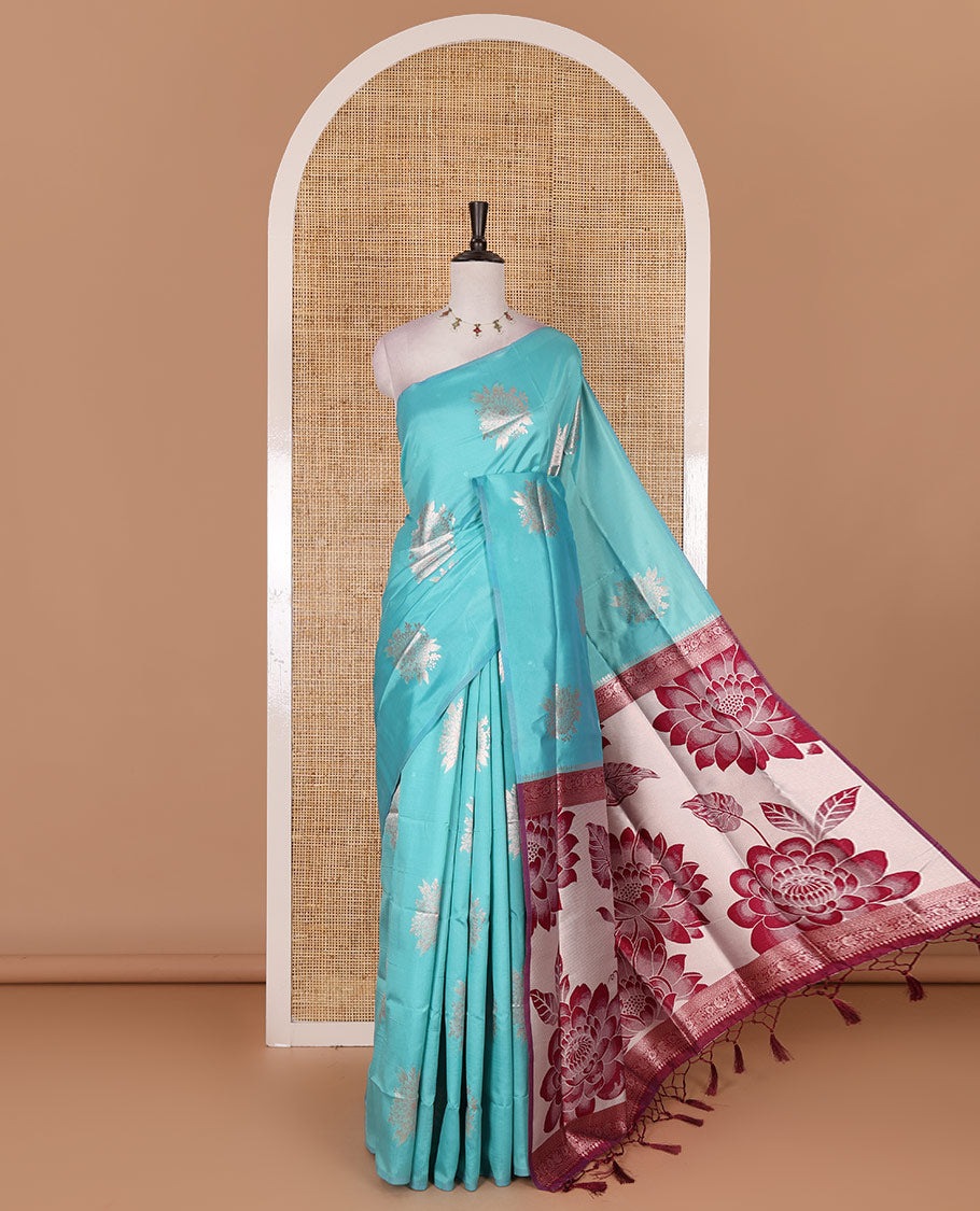 Borderless green floral motifs steeped elite soft silk saree, contrast lotus-like motifs pallu, and contrast buttas blouse