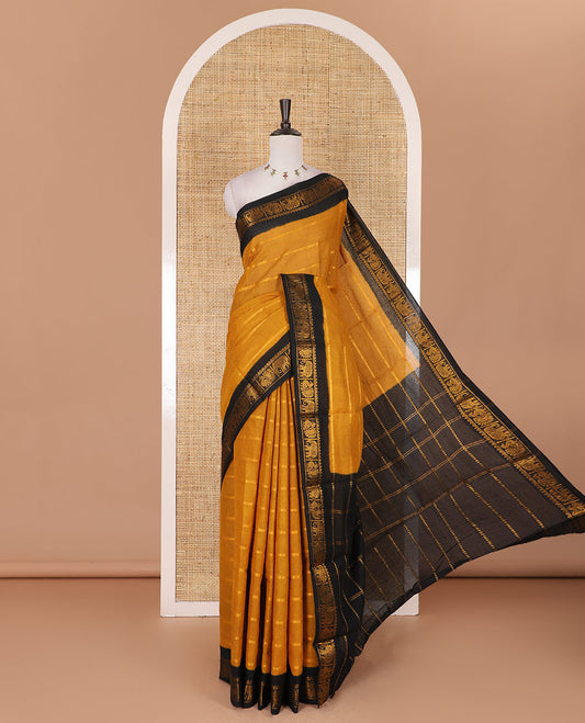 Mustard veldhari zari striped Sungudi cotton saree, contrast peacock and elephant motif border, striped pallu, and contrast zari design blouse