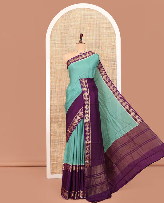 Olive Green Plain Dola Silk Saree, Complemented by Contrast Rettai Pettu Ganda Berunda Motifs, Zari Border, Gleaming Zari Striped Pallu, and Paired with a Contrast Blouse