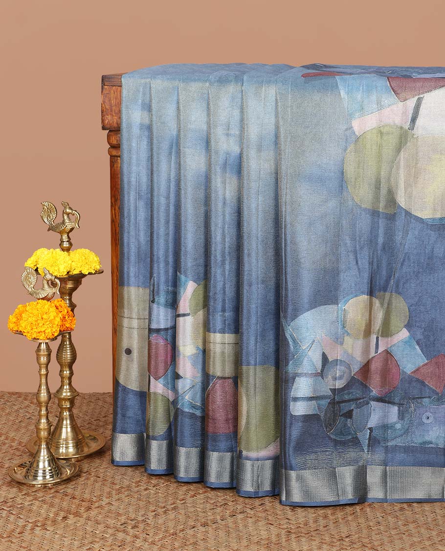 Sky blue geometrical print crush tissue saree with zari border & tissue pallu along with plain blouse