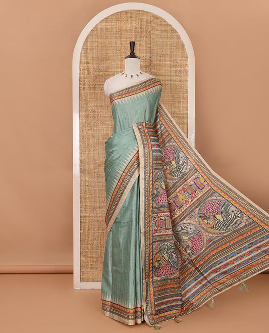 Green plain semi-tussar saree, contrast temple geometric printed border, kaleidoscope-colored Madhubani-style printed pallu & contrast plain blouse