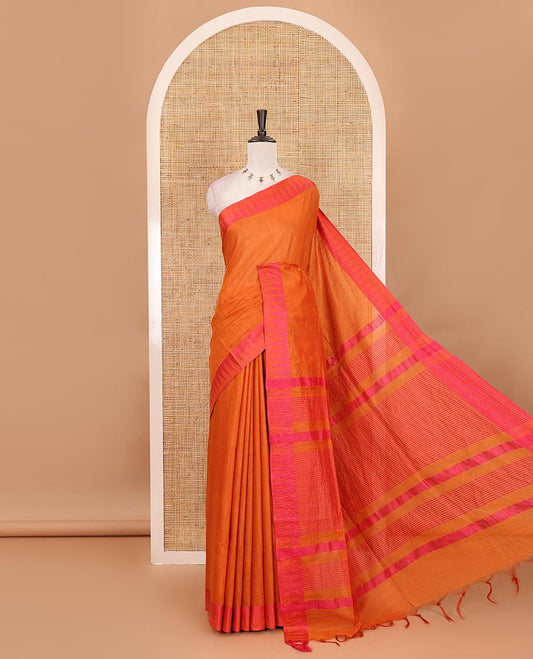 Orange plain staple cotton saree, contrast temple border, striped pallu & vertical striped blouse