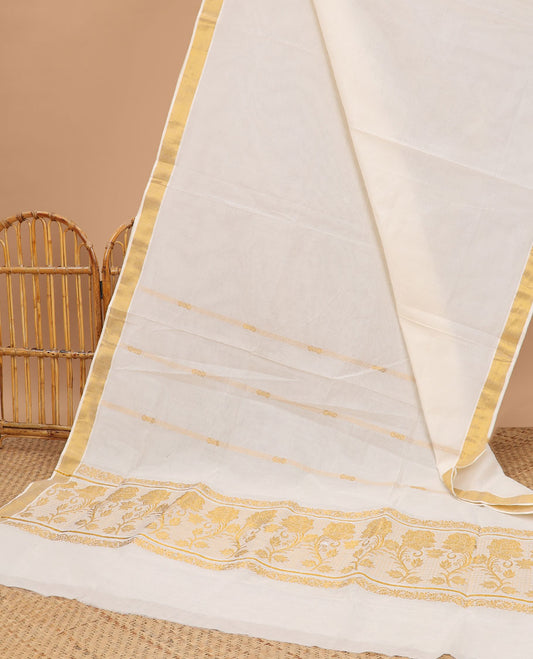 Cream kerala saree with zari stripes, zari border & pallu of floral designs in zari