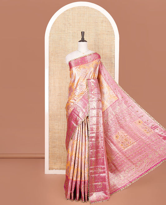 Orange Vastrakala Silk Saree, Gracefully Adorned with Floral Jacquard and Stone Work, Complemented by Contrast Zari and Stone-Embroidered Scallop Border, Grandly Zari and Stone Decked Up Pallu, and Paired with Contrast Embroidered Blouse