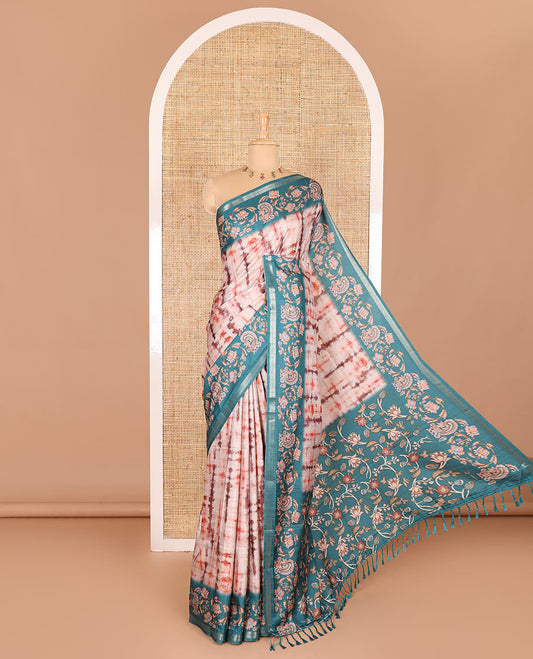 Orange shibori printed katan silk saree, contrast border, and pallu of kalamkari floral vine and peacock print, and a contrast leaf printed blouse