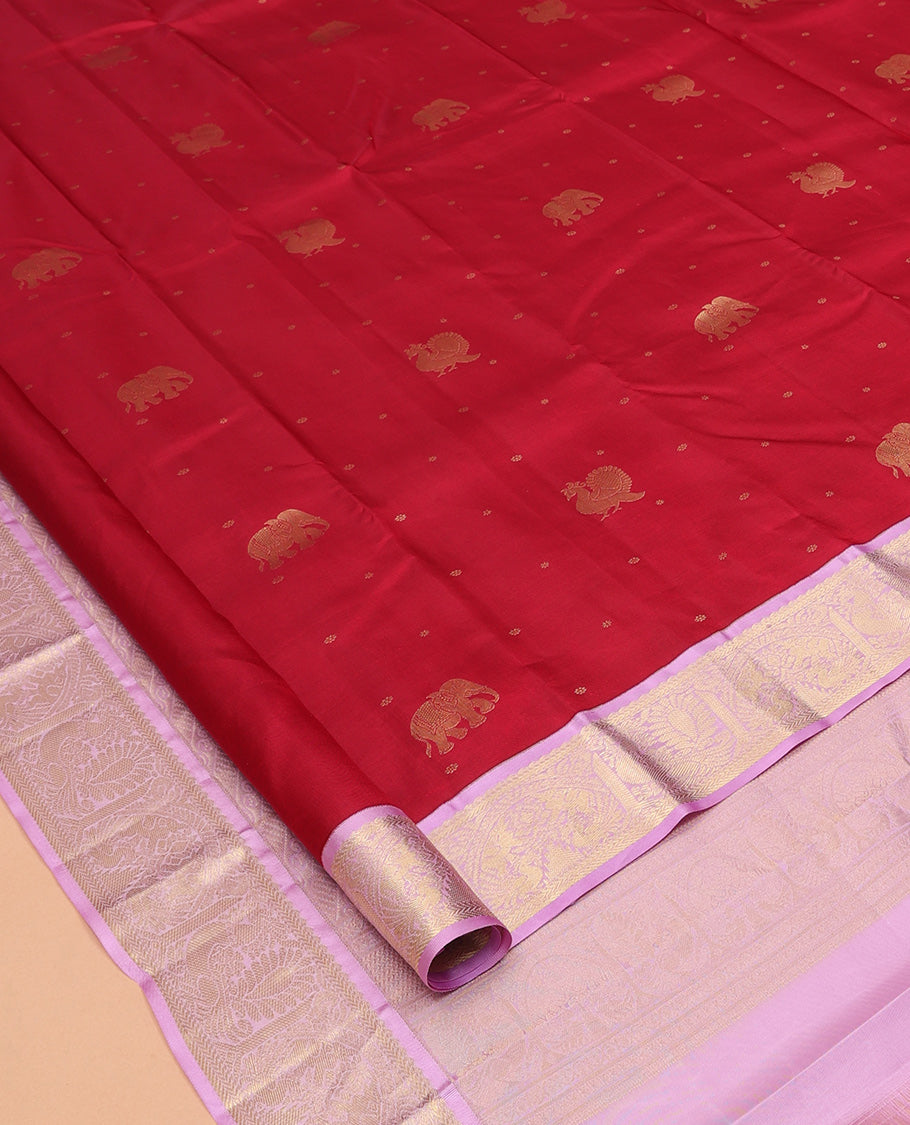 Pink Vasundhara Silk Saree Elevated with Yaanai and Mayil Buttas, Complemented by a Contrast Border of Muthu, Kathir, Mayil, and Yaanai Designs, Pallu Embellished with Diagonal Stripes, and Paired with a Contrast Blouse