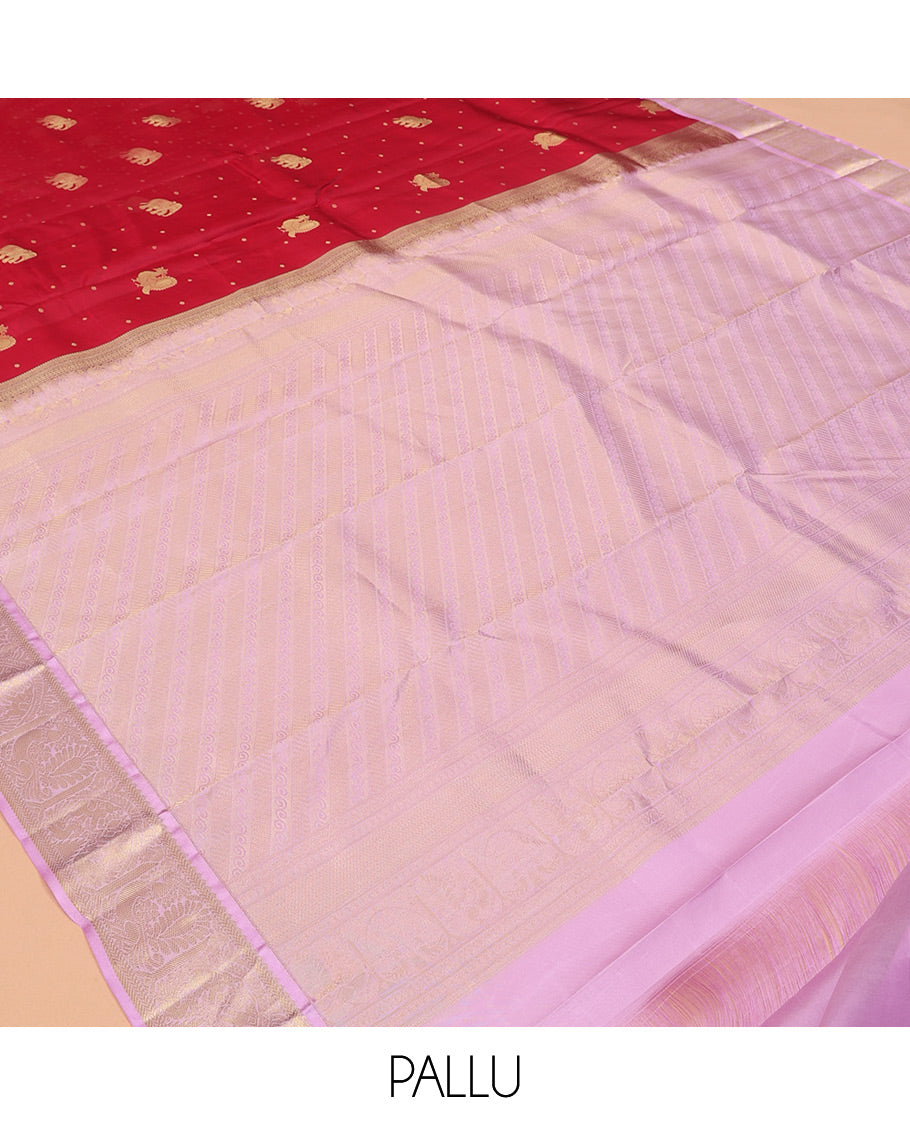 Pink Vasundhara Silk Saree Elevated with Yaanai and Mayil Buttas, Complemented by a Contrast Border of Muthu, Kathir, Mayil, and Yaanai Designs, Pallu Embellished with Diagonal Stripes, and Paired with a Contrast Blouse