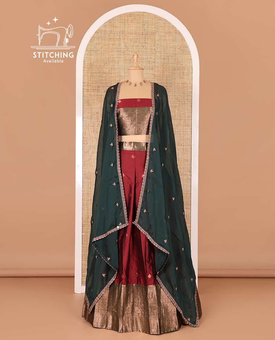 Maroon taffeta silk half-saree, zari buttas and contrast traditional zari bordered skirt, a matching blouse, and contrast embroidered satin georgette  dhavani