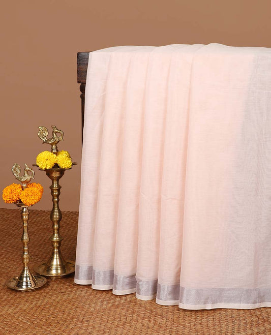 Light pink linen mix cotton saree with silver zari border & contrast pallu along with contrast blouse
