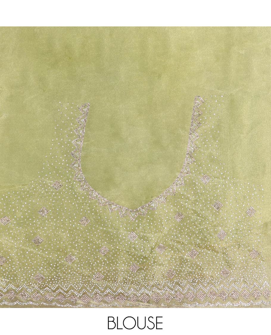 Green Designer Saree, Gleamed Up with Stone Embroidered Buttas on Its Body, Highlighted by Scallop Stone Work Border, Pallu of Stone Work, and Paired with a Heavily Stone Embellished Matching Blouse