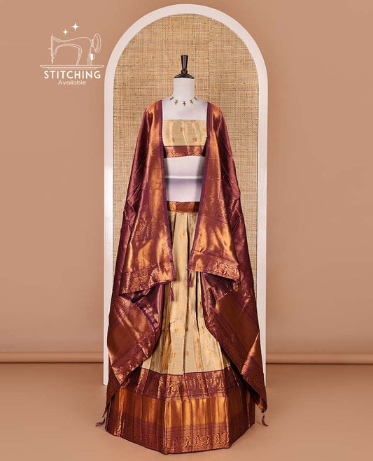 Gold banaras half saree, zari buttas with contrast wine traditional zari border skirt, matching blouse, dhavani of zari checks, and buttas