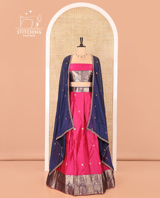 Pink and Navy Blue Semi-Banarasi Half-Saree, Elegantly Woven with Zari Buttas on Its Skirt, Complemented by a Contrast Intricately Zari-Designed Border, Paired with a Matching Blouse, and a Contrast Satin Georgette Embroidered Scallop Dhavani